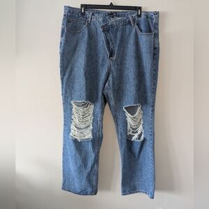 22 Fashion Nova Medium Wash Distressed Crossover Waist Jeans
